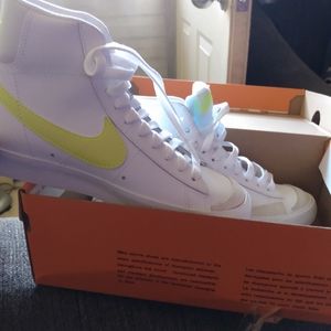 White and yellow Nike Blaze tennis